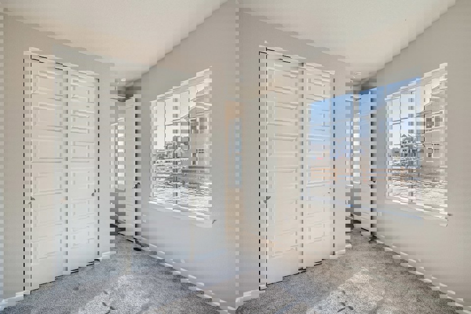 A room with white doors.