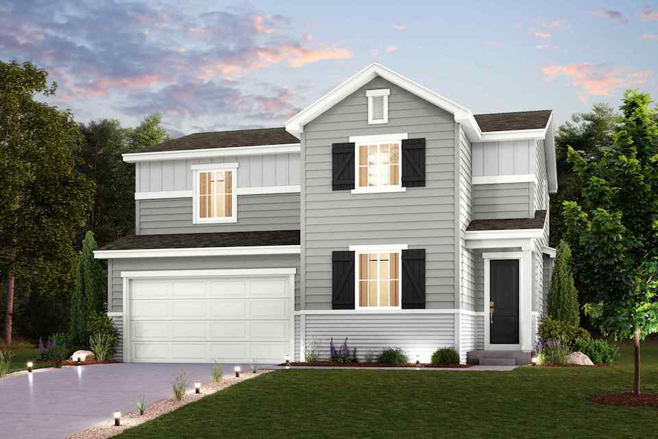 A white house with a garage.