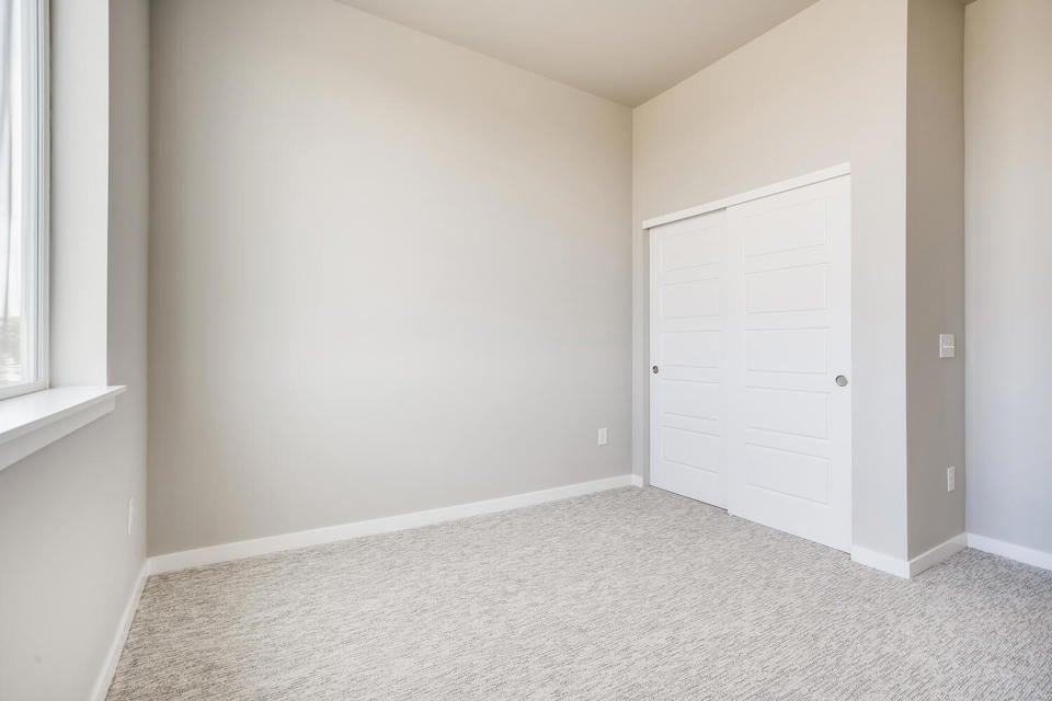 A room with white doors.