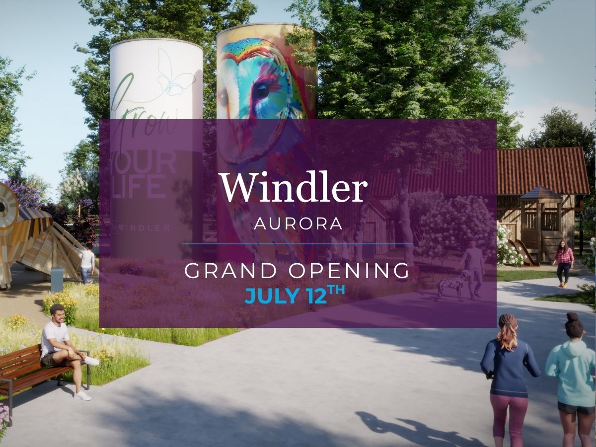 A sign with a person sitting on a bench.