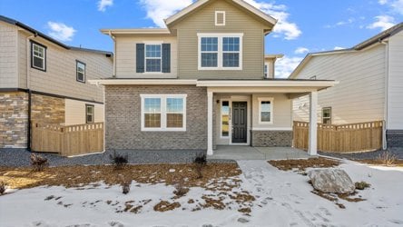 A house with snow on the ground.