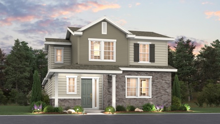 A house with trees in the back.