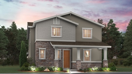 A house with trees in the back.