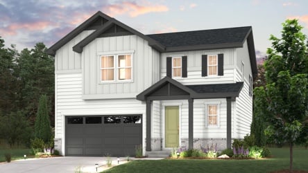 A white house with a garage.