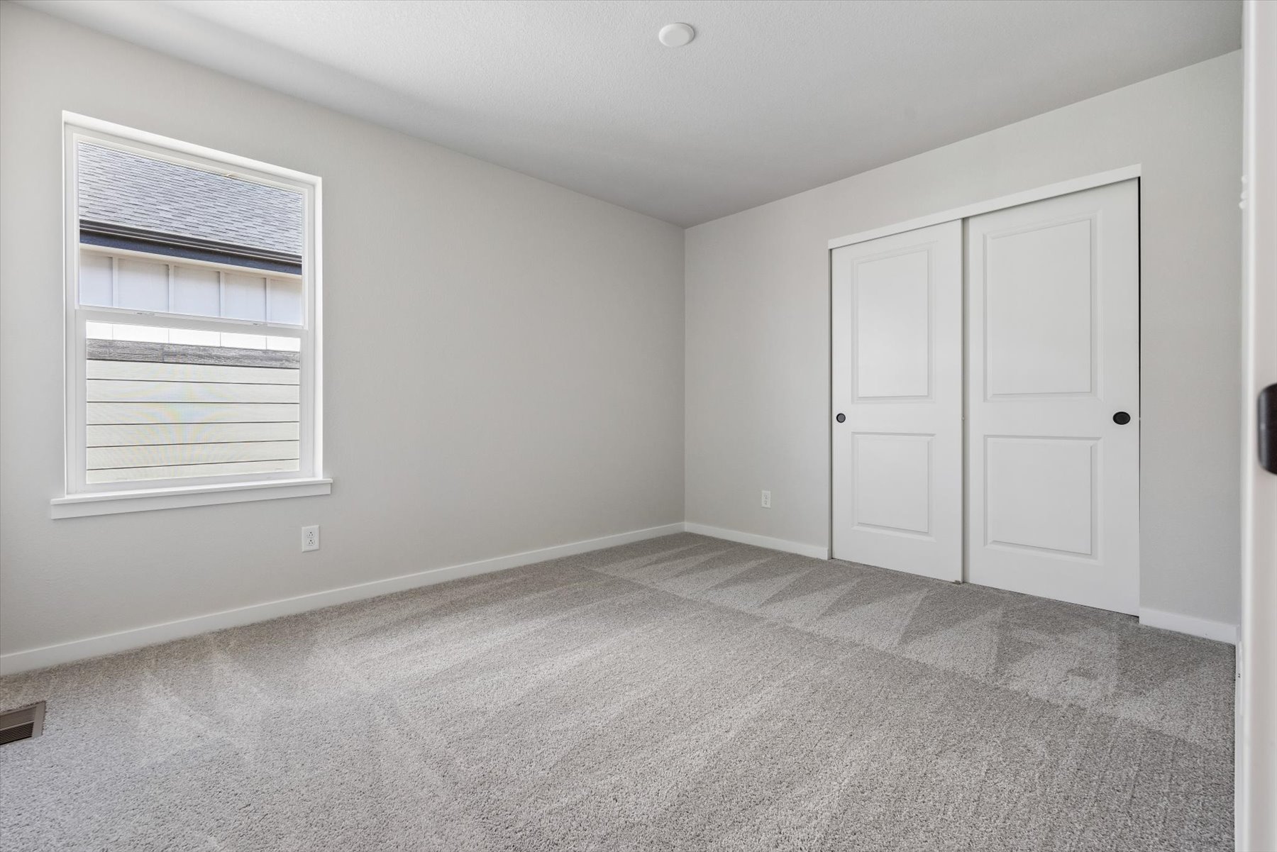 A room with white doors.