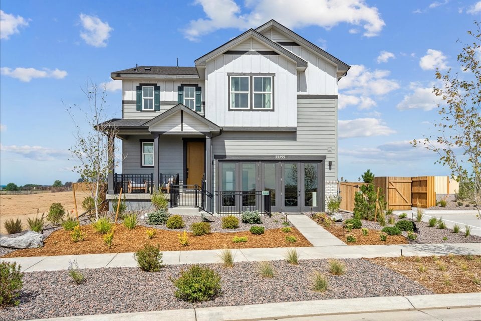 A house with a fence around it.