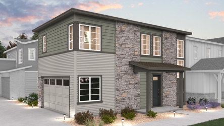 A grey house with a driveway with Mark Twain Boyhood Home & Museum in the background.