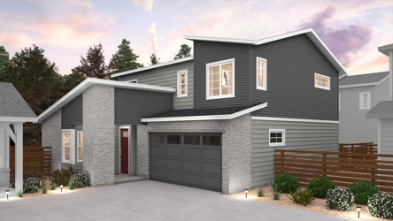 A grey house with a garage.