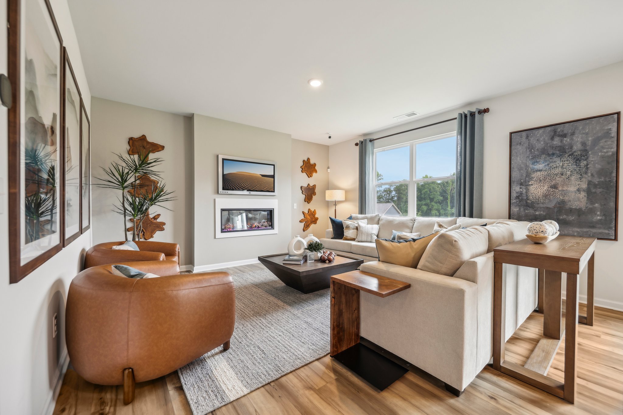 A living room with a large window.
