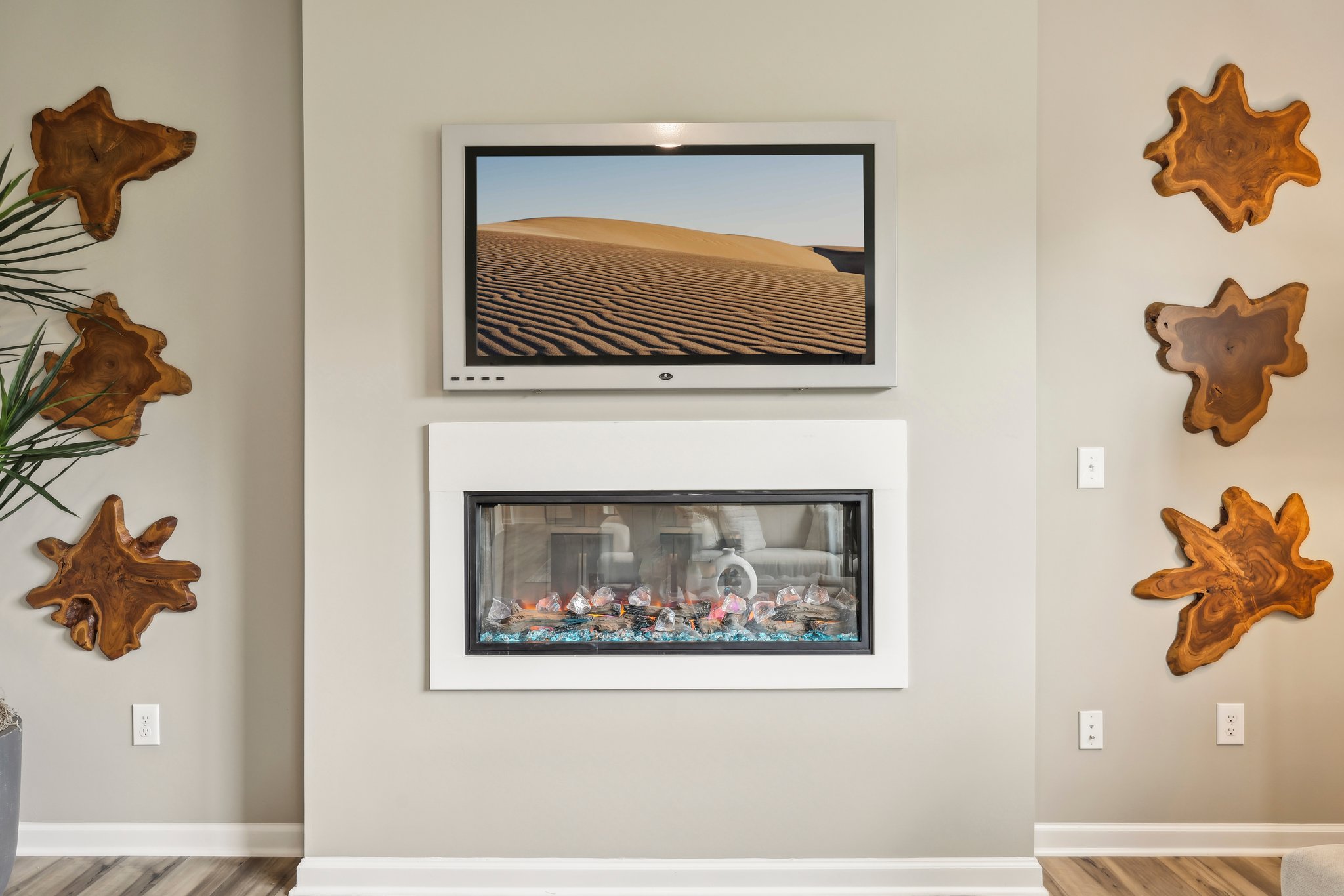 A wall with pictures on it.