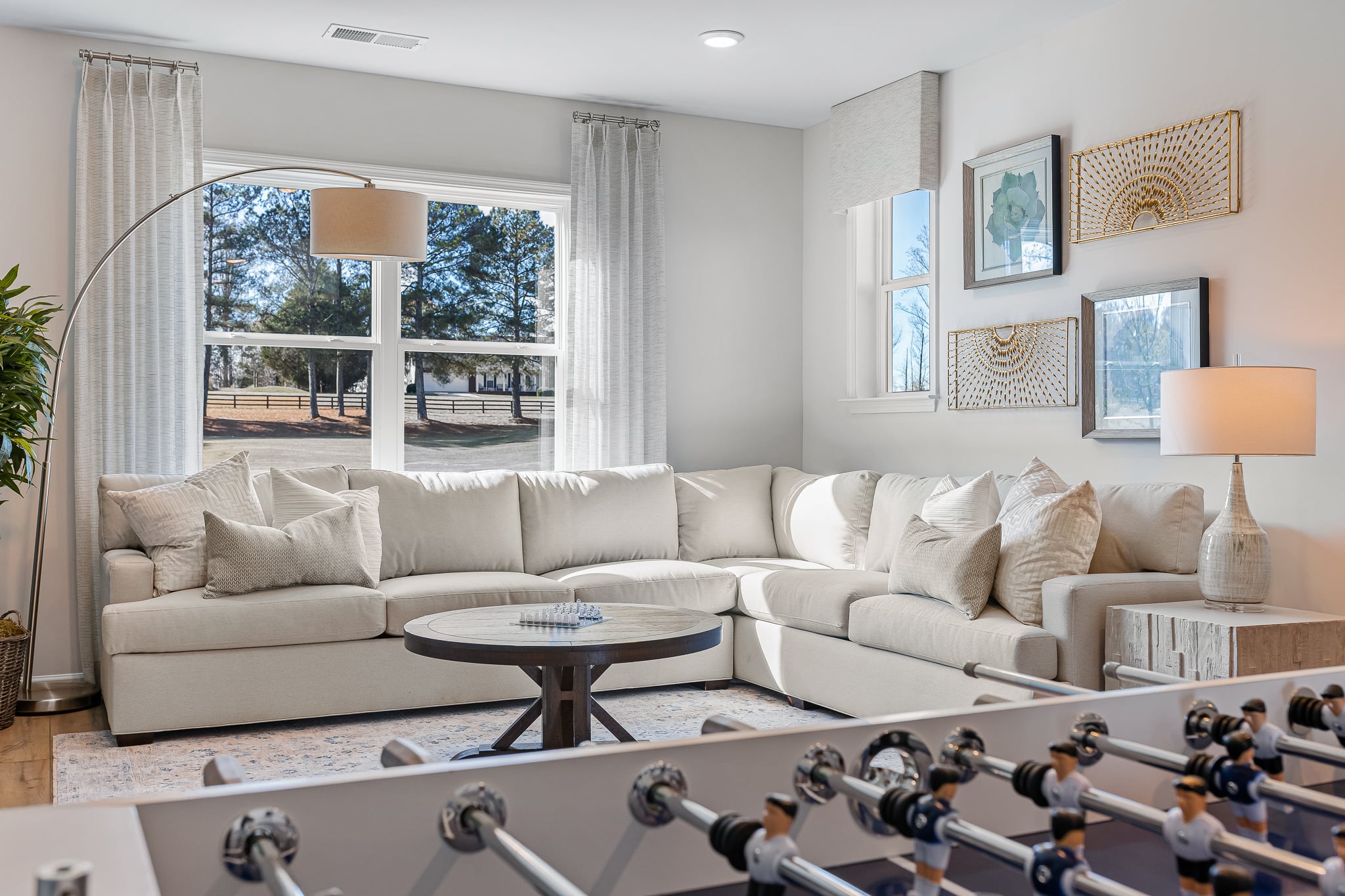 A living room with a large window.