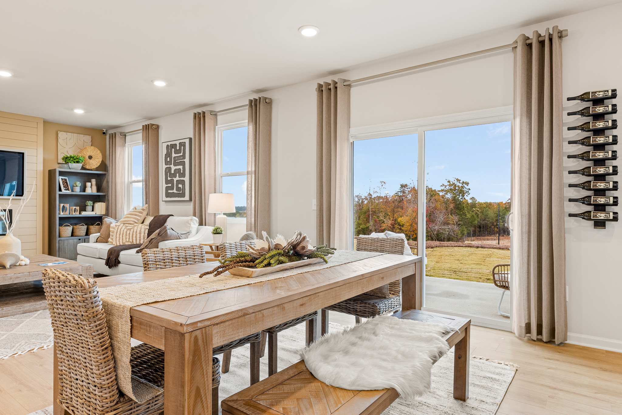 A living room with a large table.