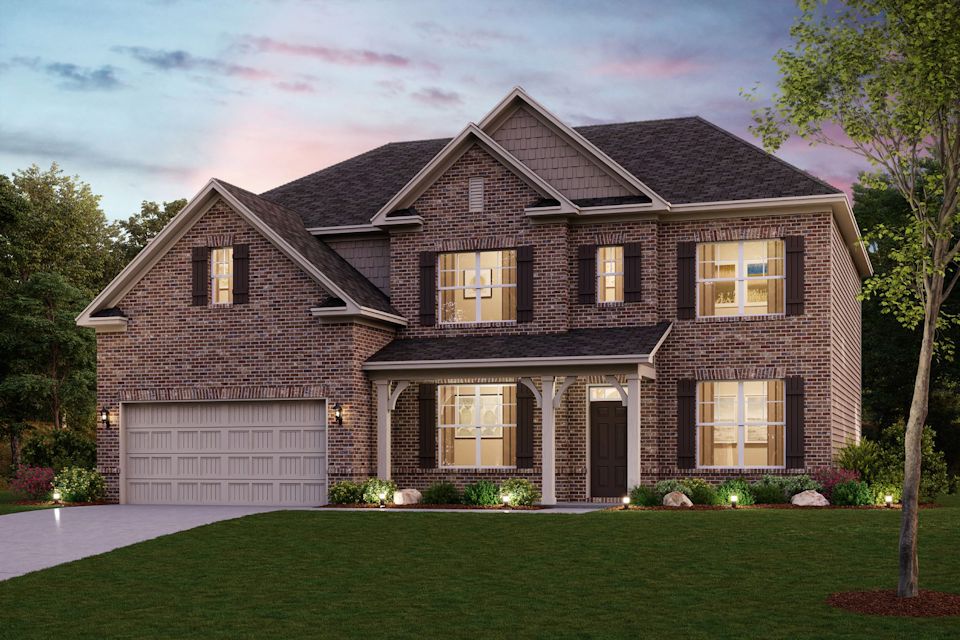 A house with a large front yard.