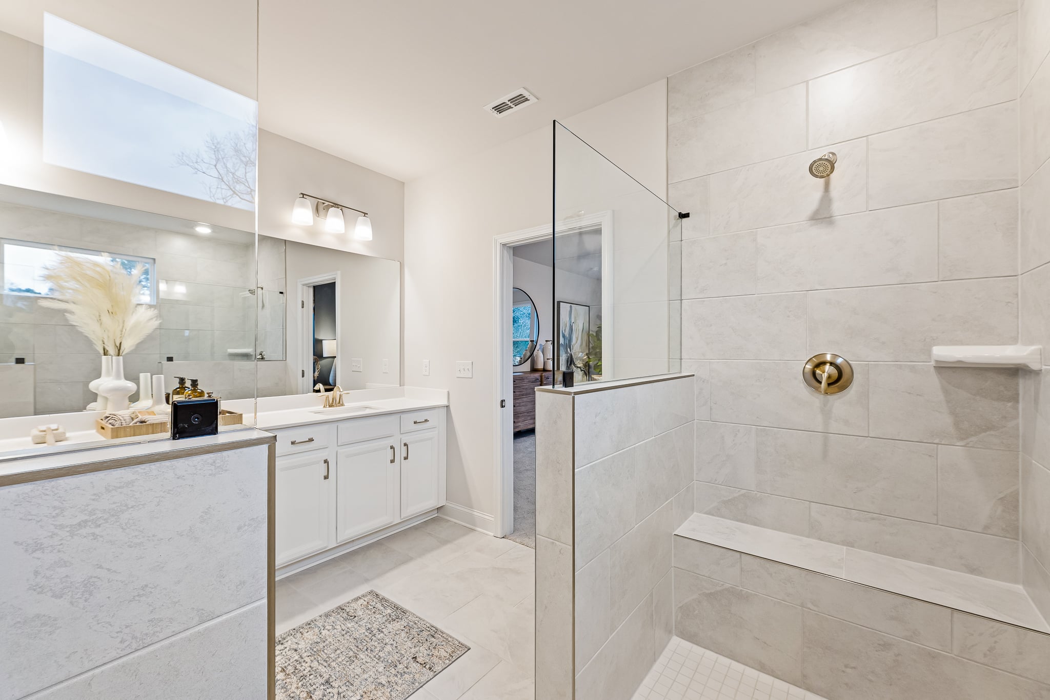 A bathroom with a tub and sink.