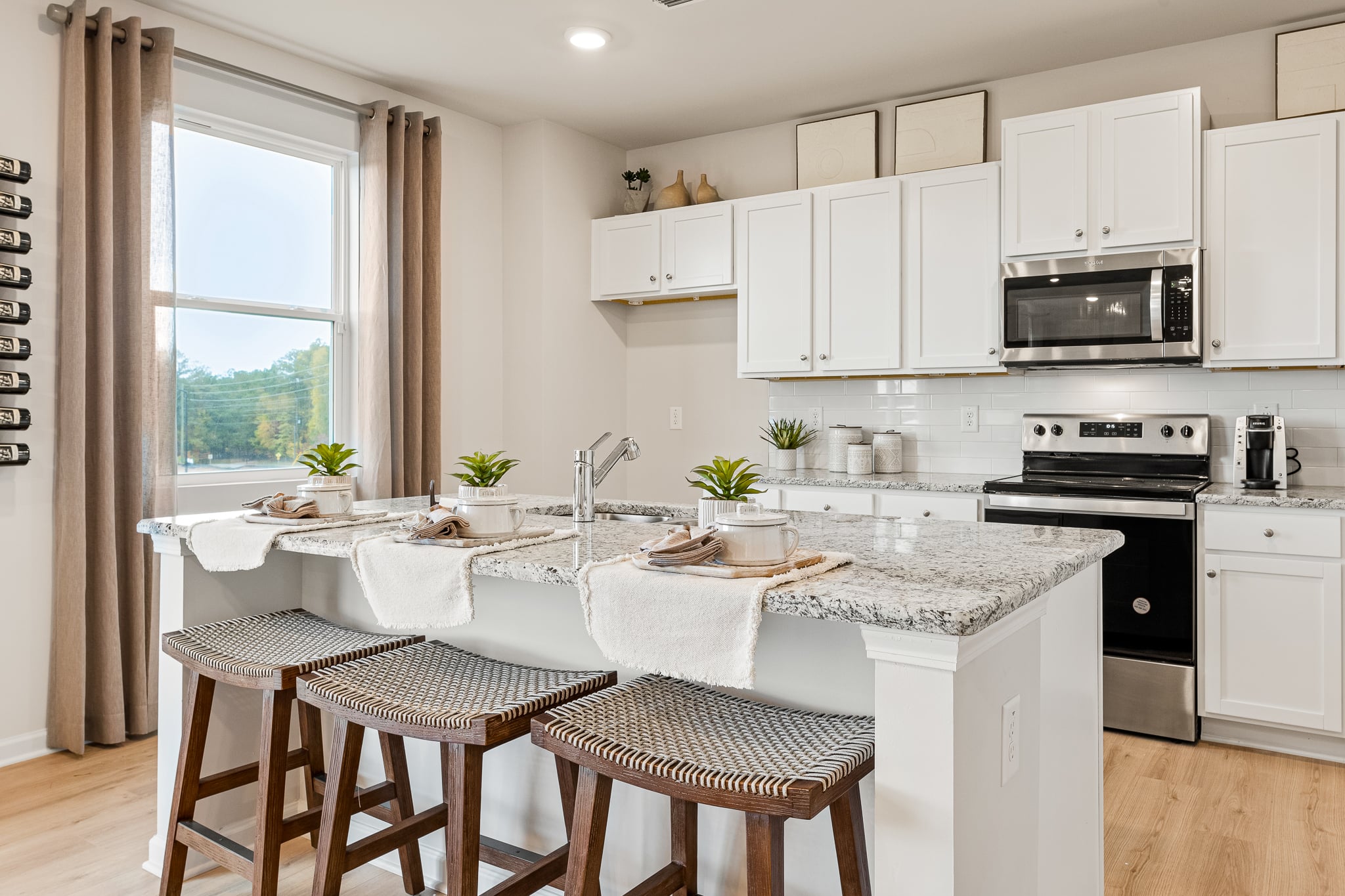 A kitchen with a large island.