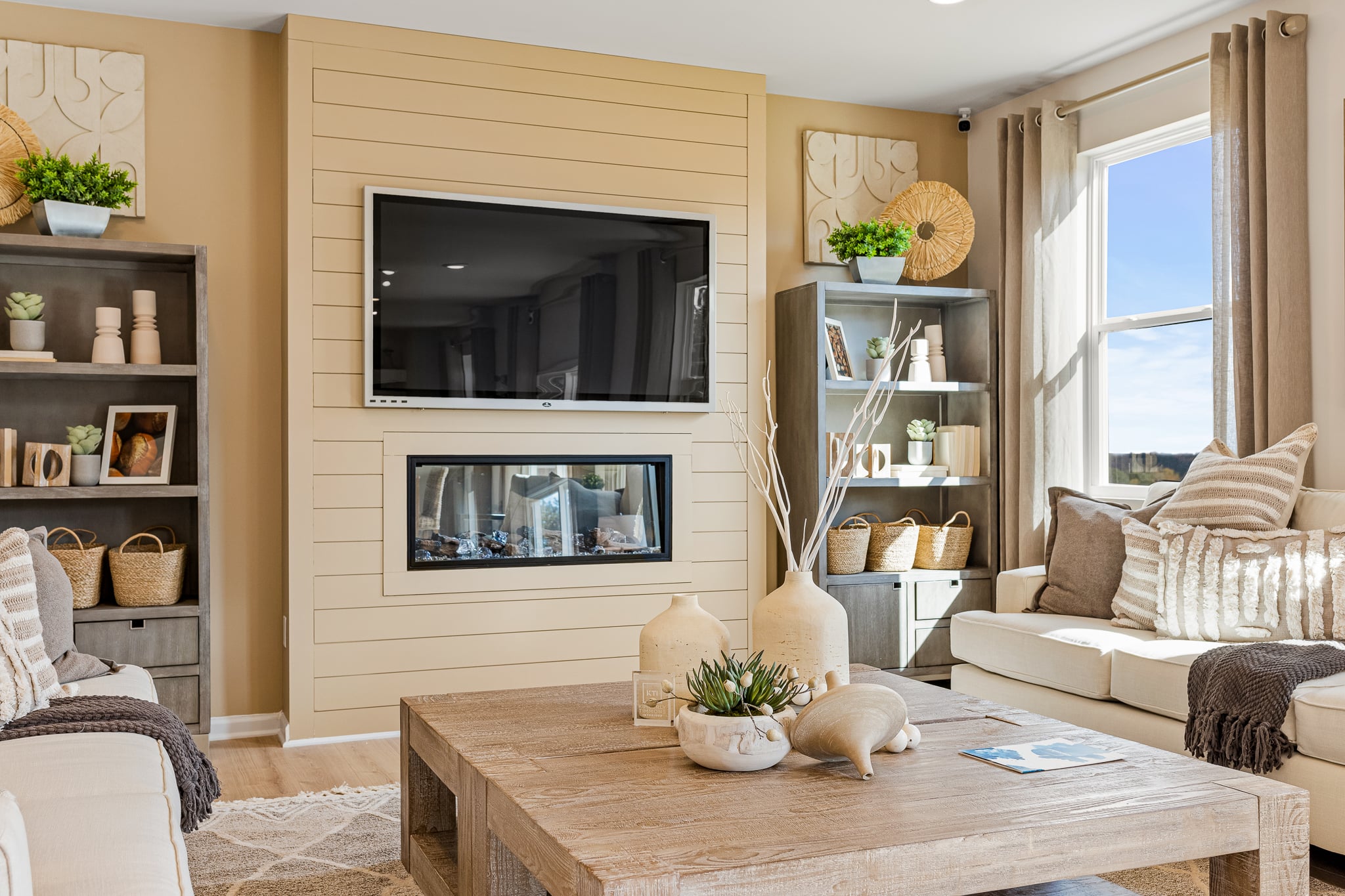 A living room with a fireplace.
