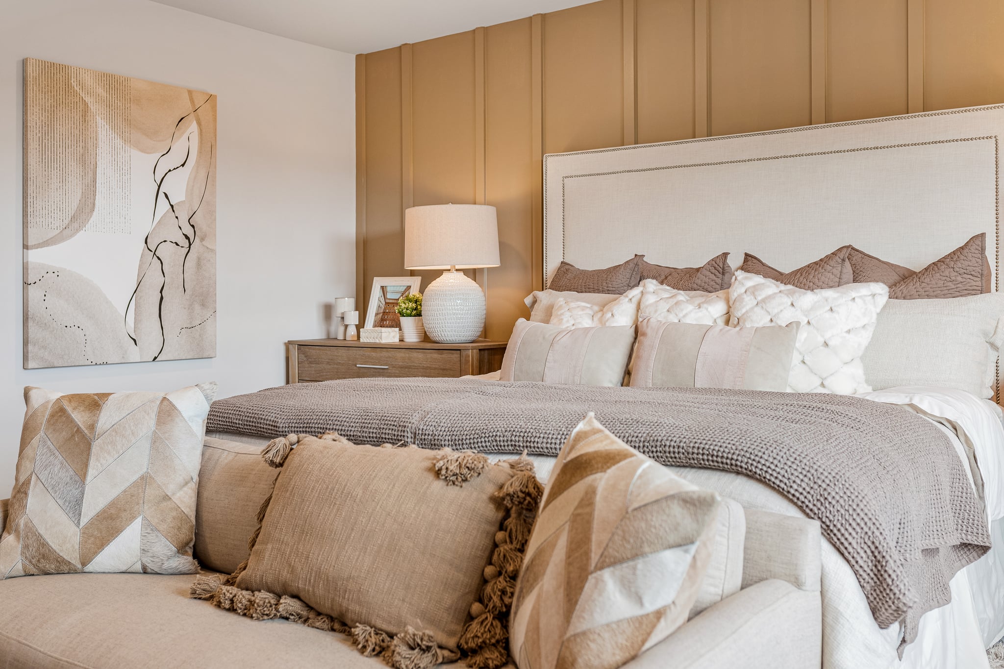 A bed with pillows.