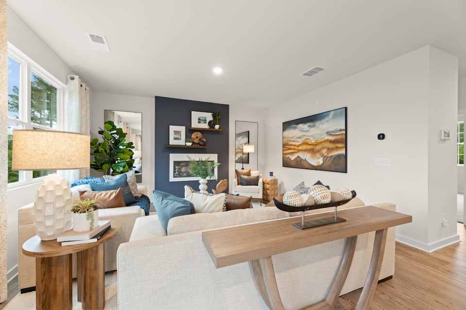 A living room with a couch and a coffee table.