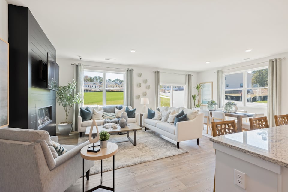 A living room with a large window.