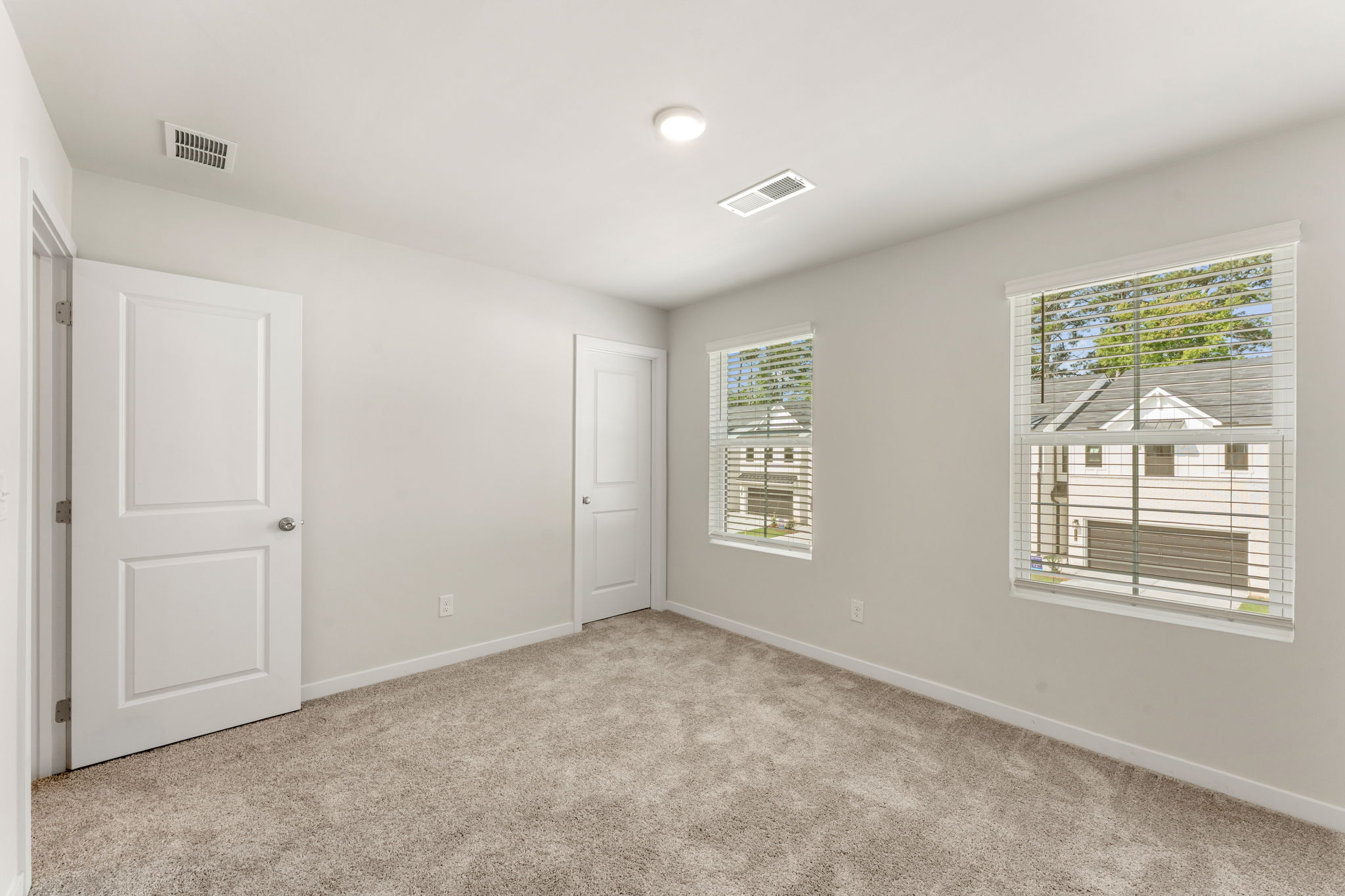 A room with white doors.