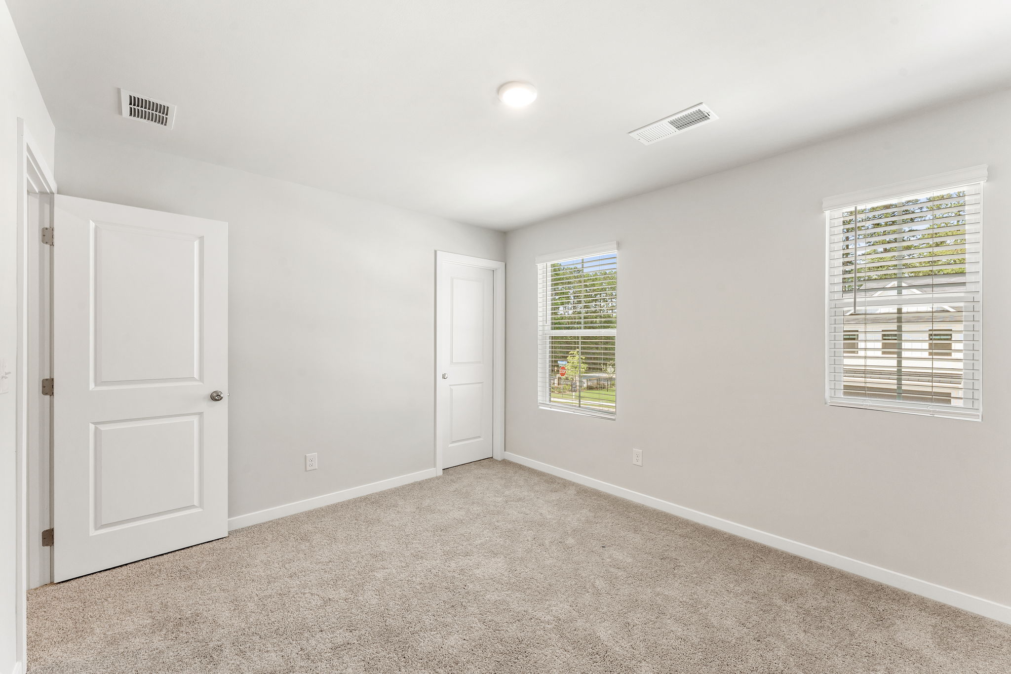A room with white doors.
