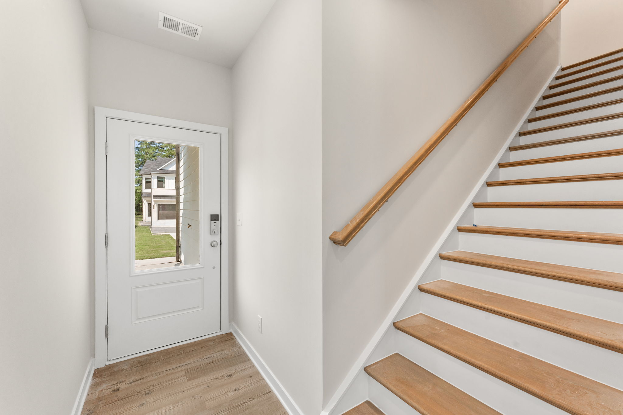 A staircase leading to a door.