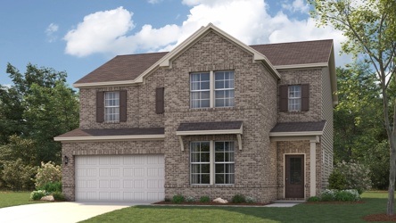 A house with a garage with Winslow Crocker House in the background.