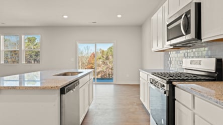 A kitchen with a large island.