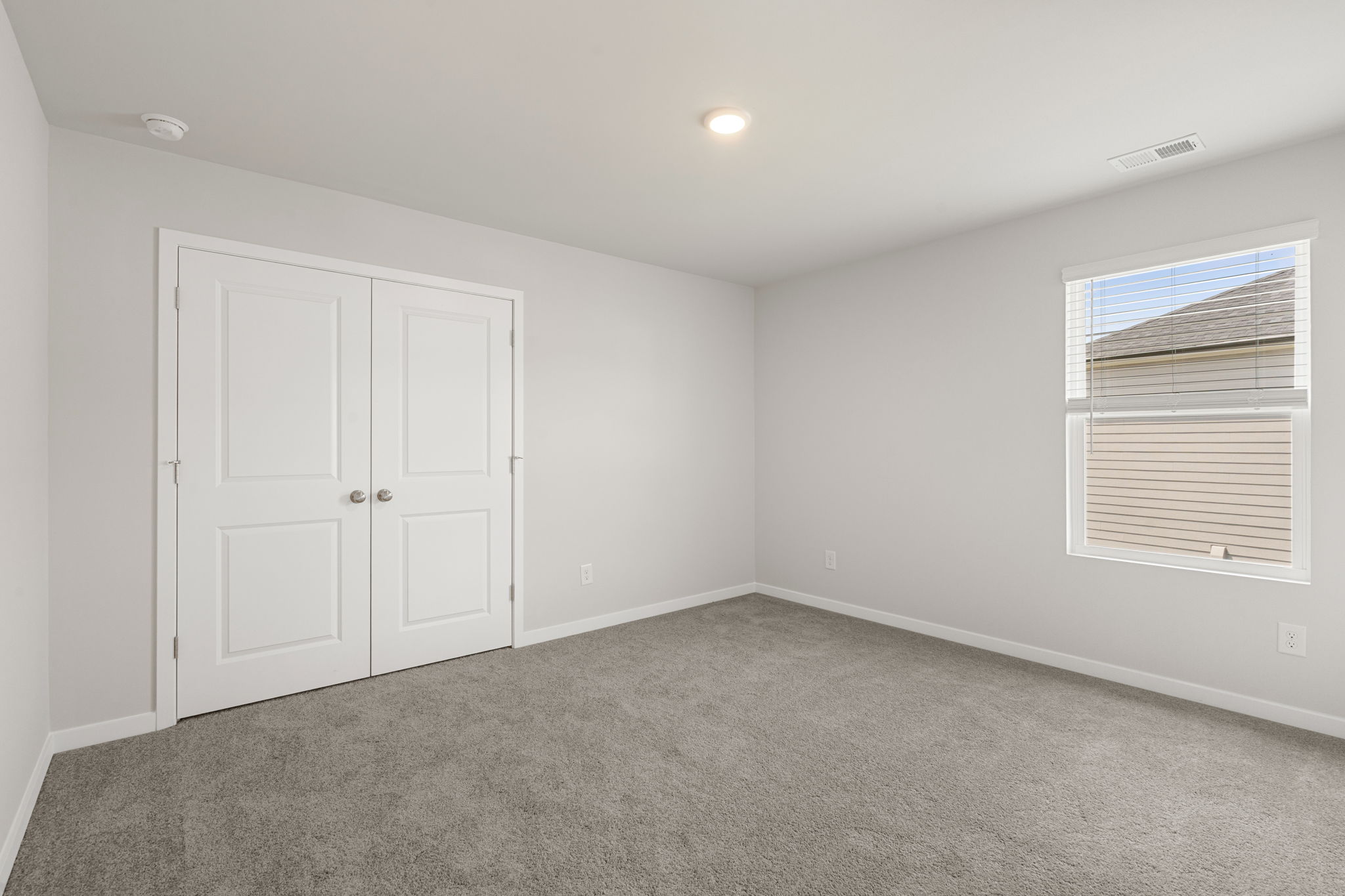A room with white doors.