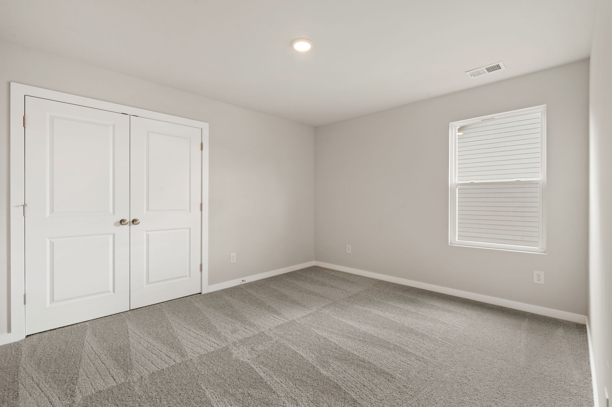 A room with white doors.
