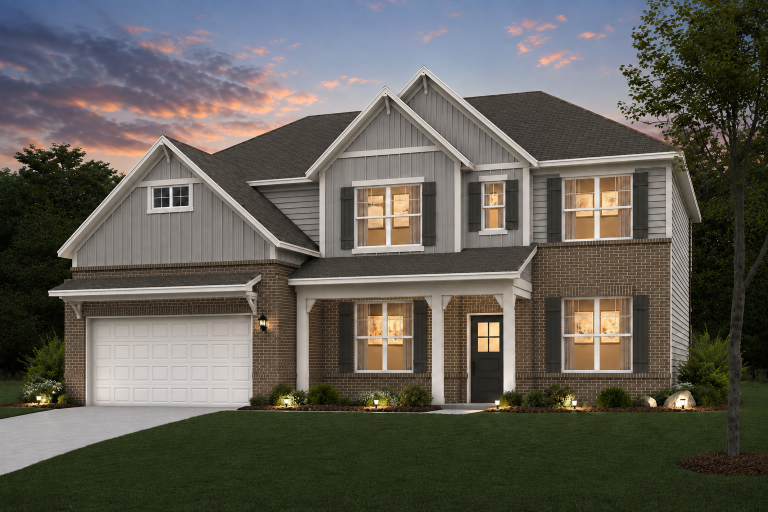 A house with a large front yard.