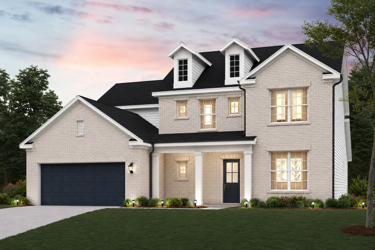 A house with a lawn in front.