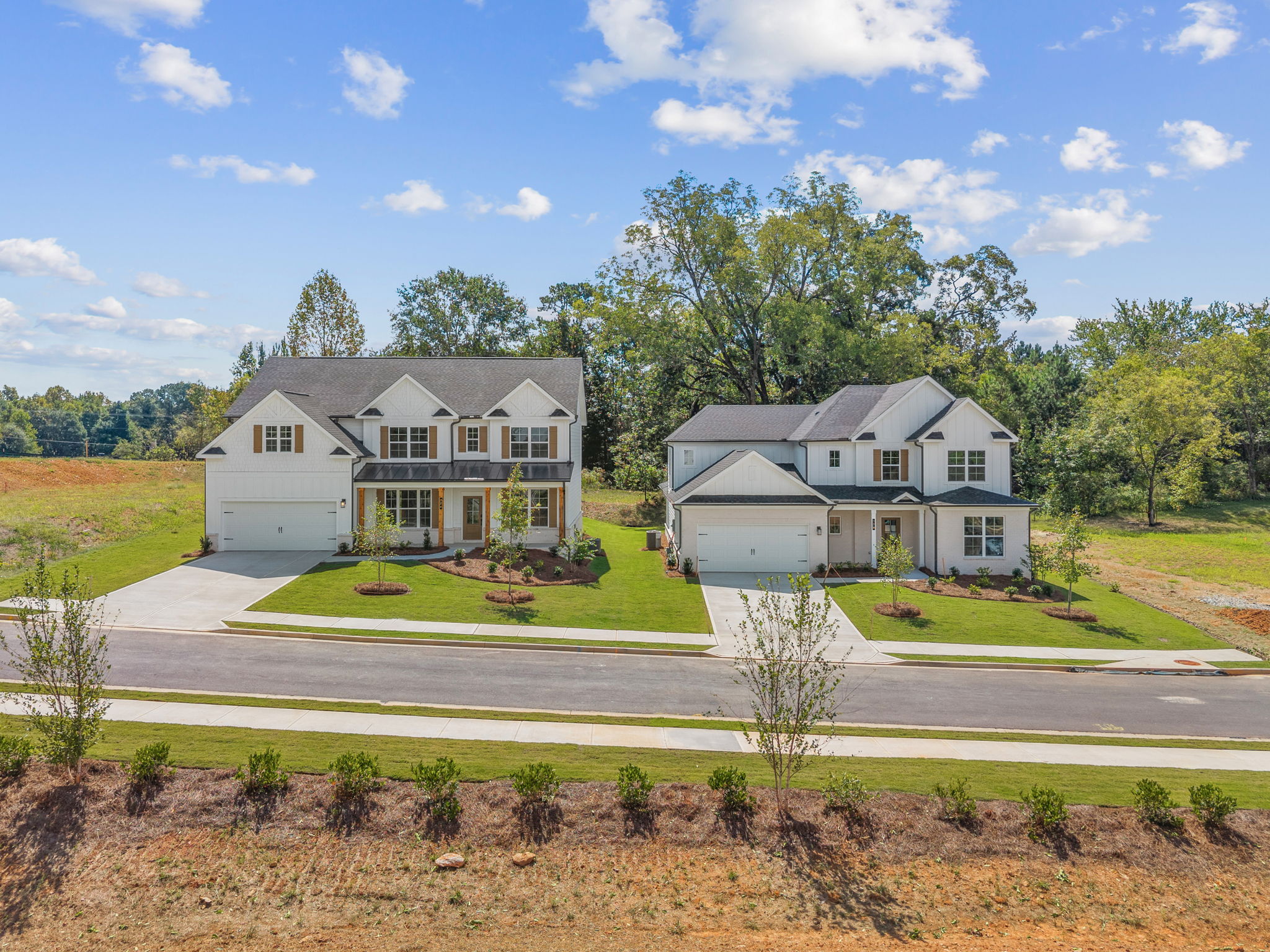 A house with trees and grass.