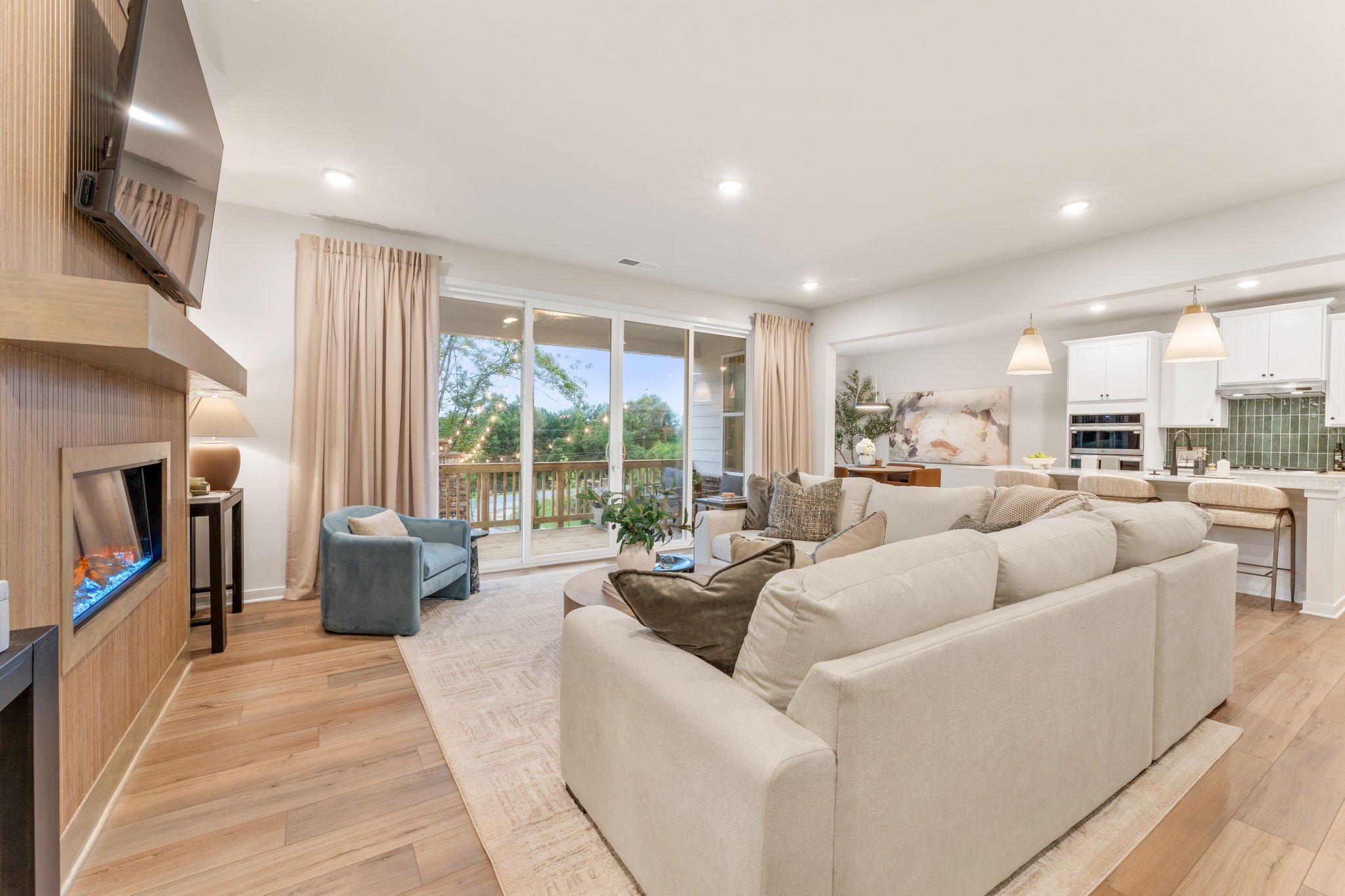 A living room with a large window.