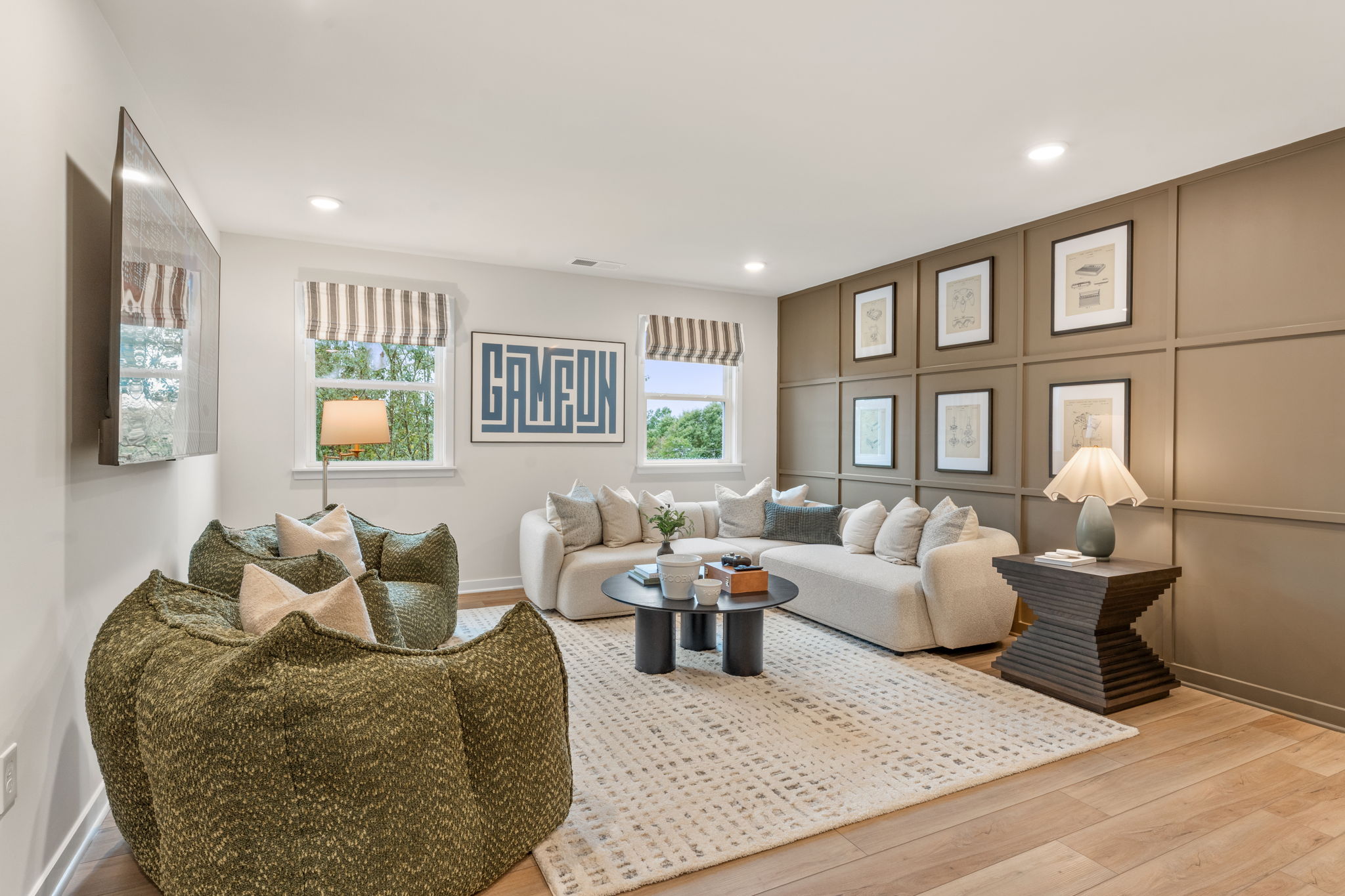 A living room with a couch and a table.