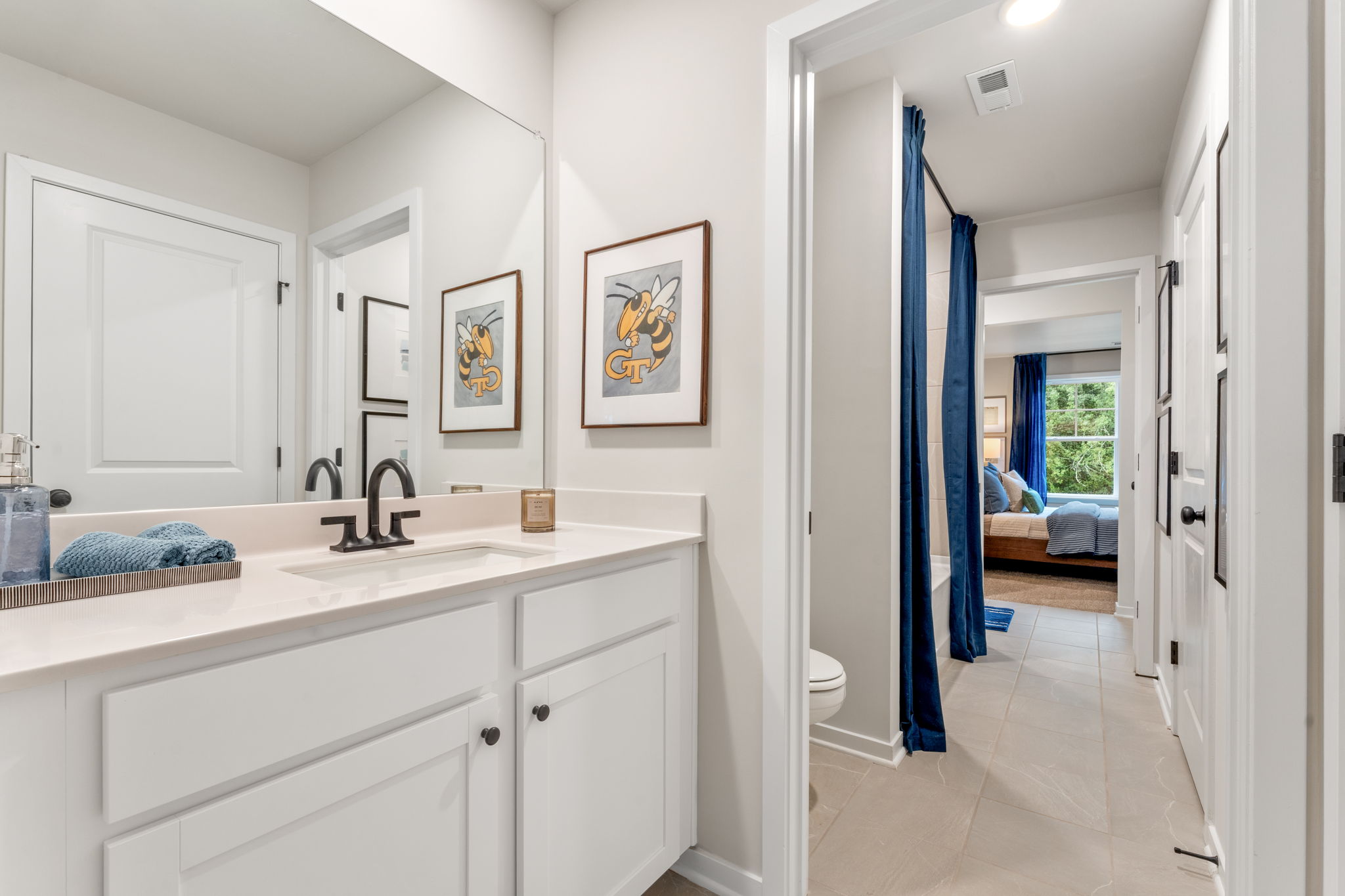 A bathroom with a sink and a toilet.