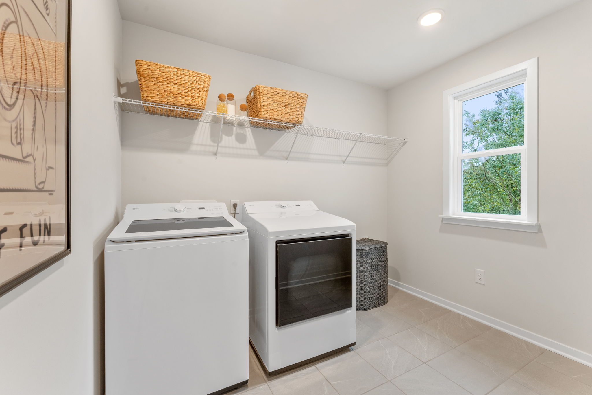 A kitchen with a stove and shelves.