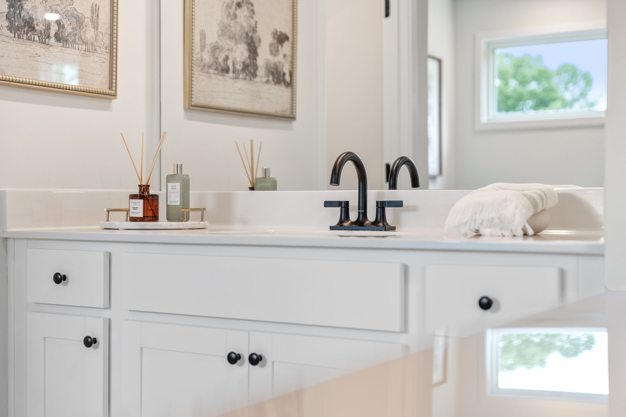 A bathroom with a sink and a bathtub.