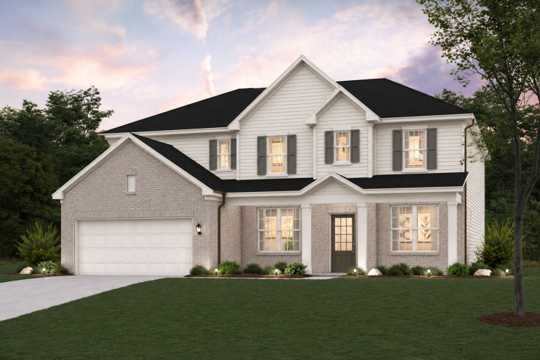 A house with a large front yard.