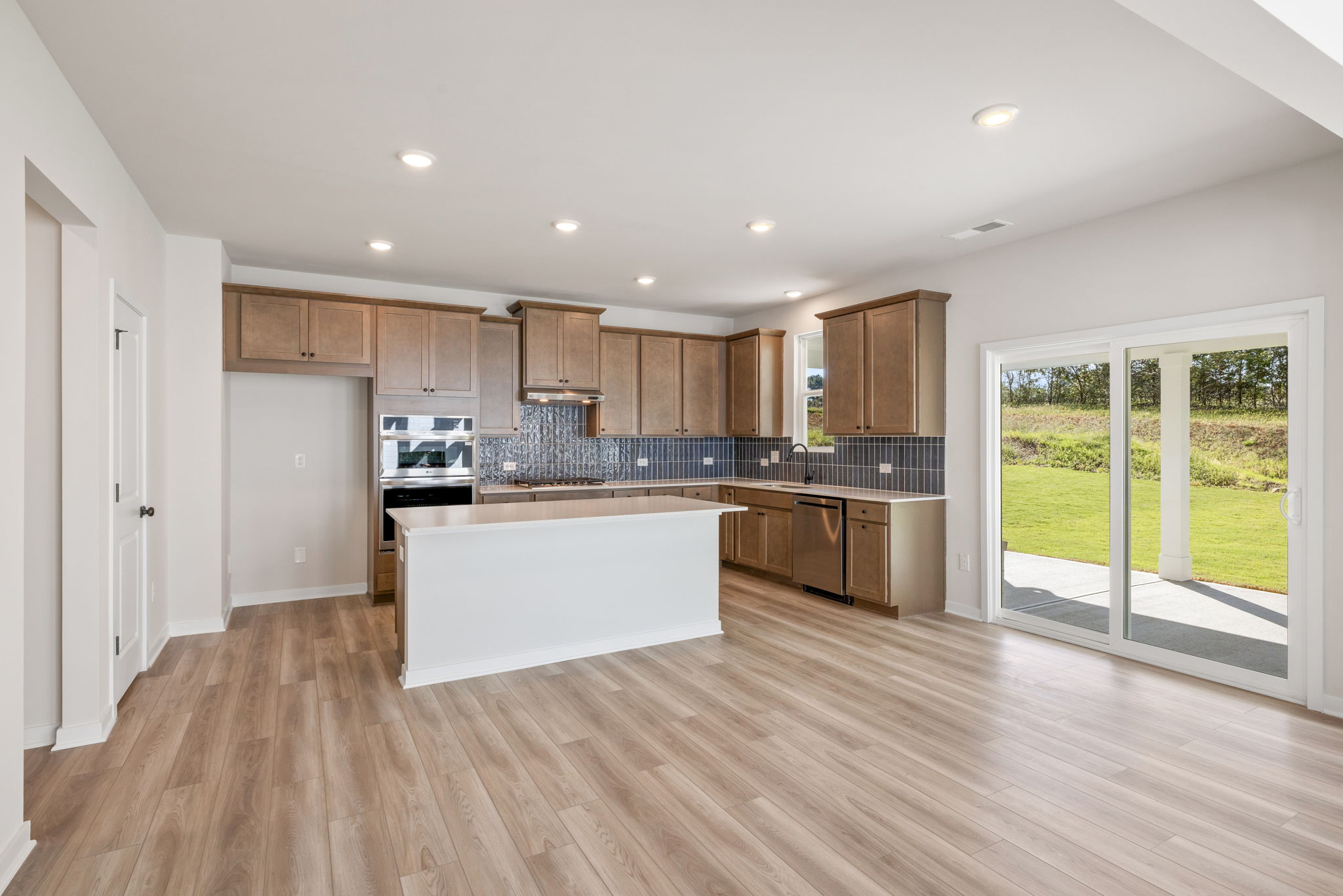 A kitchen with a large island.