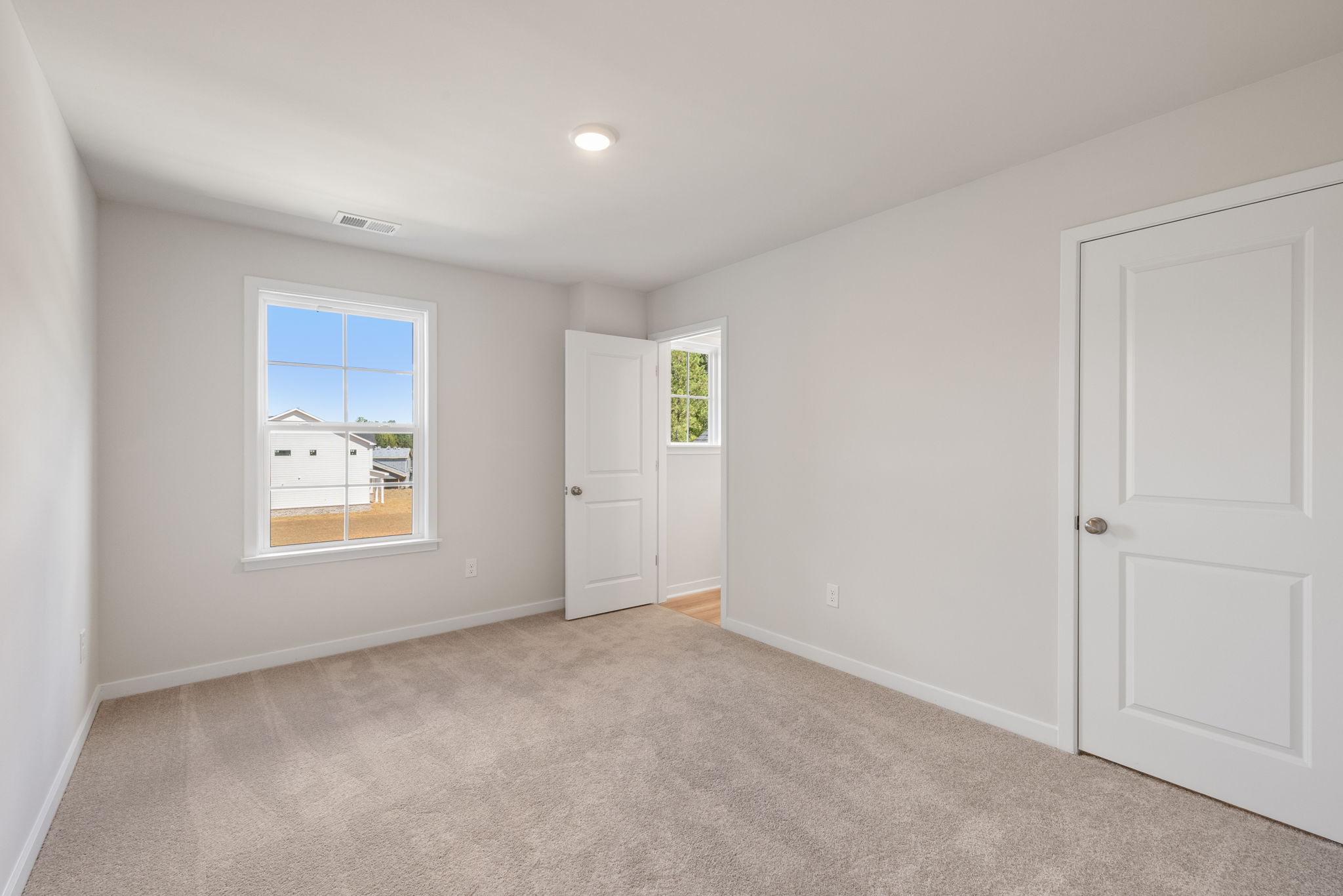 A room with white doors.