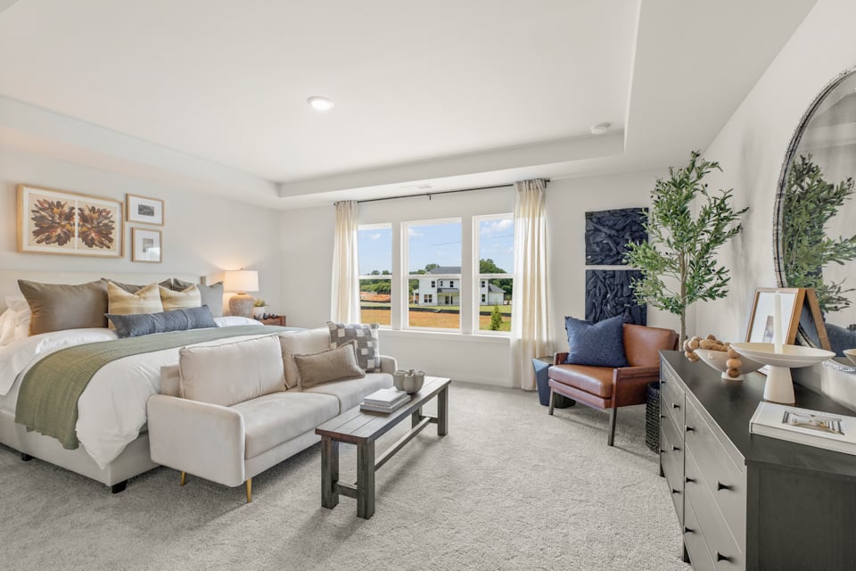 A living room with a large window.