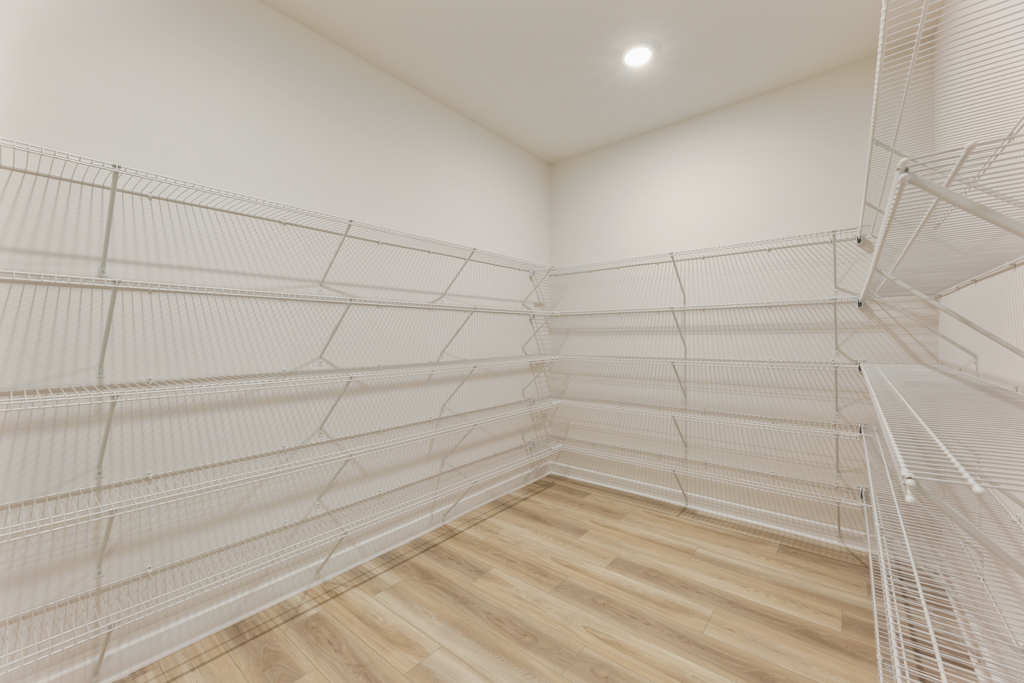 A white staircase in a room.