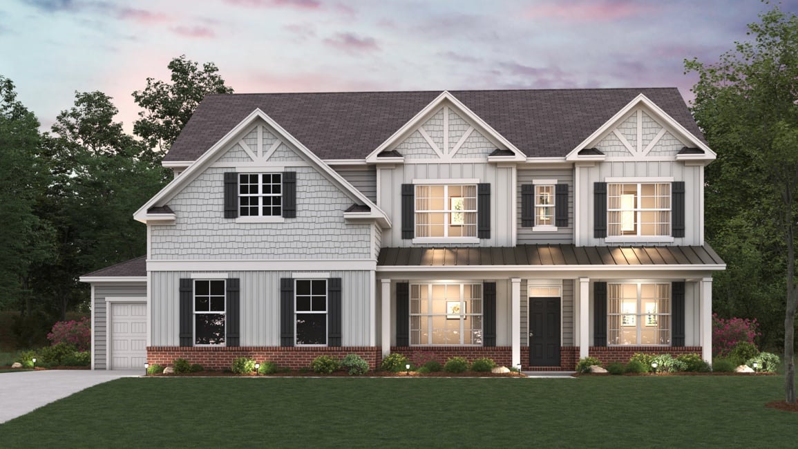A house with a lawn in front.