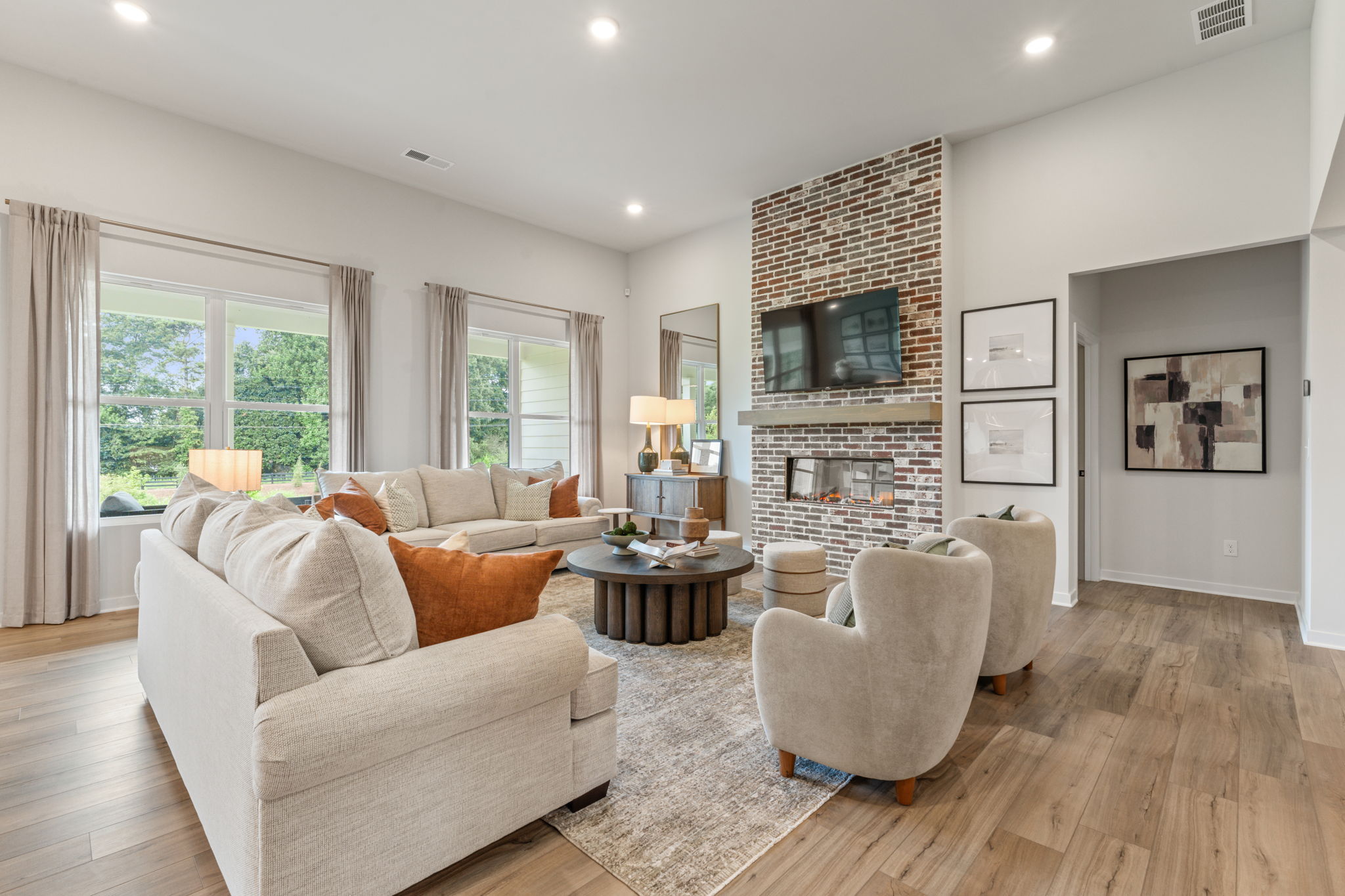 A living room with a fireplace.