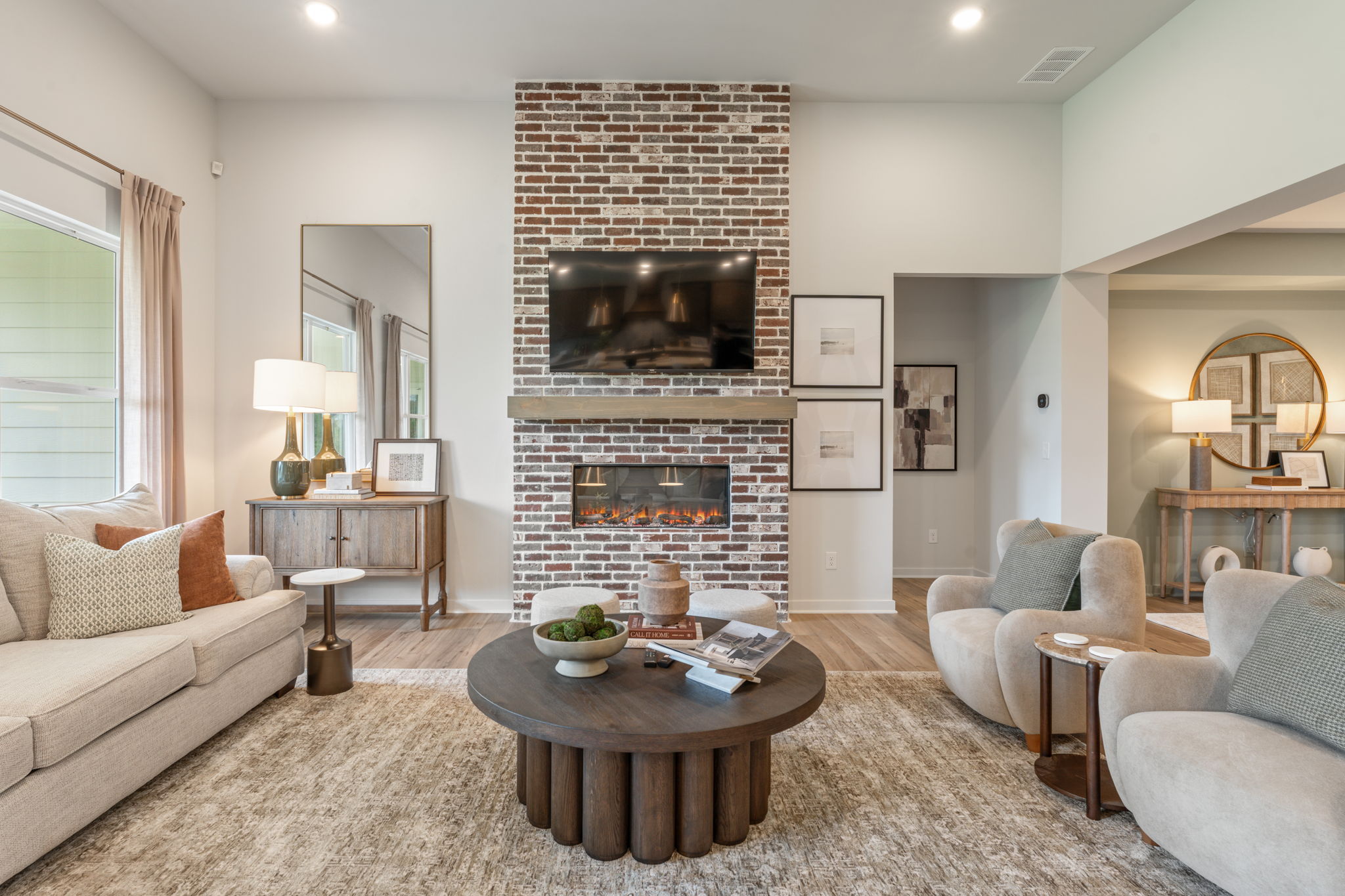 A living room with a fireplace.