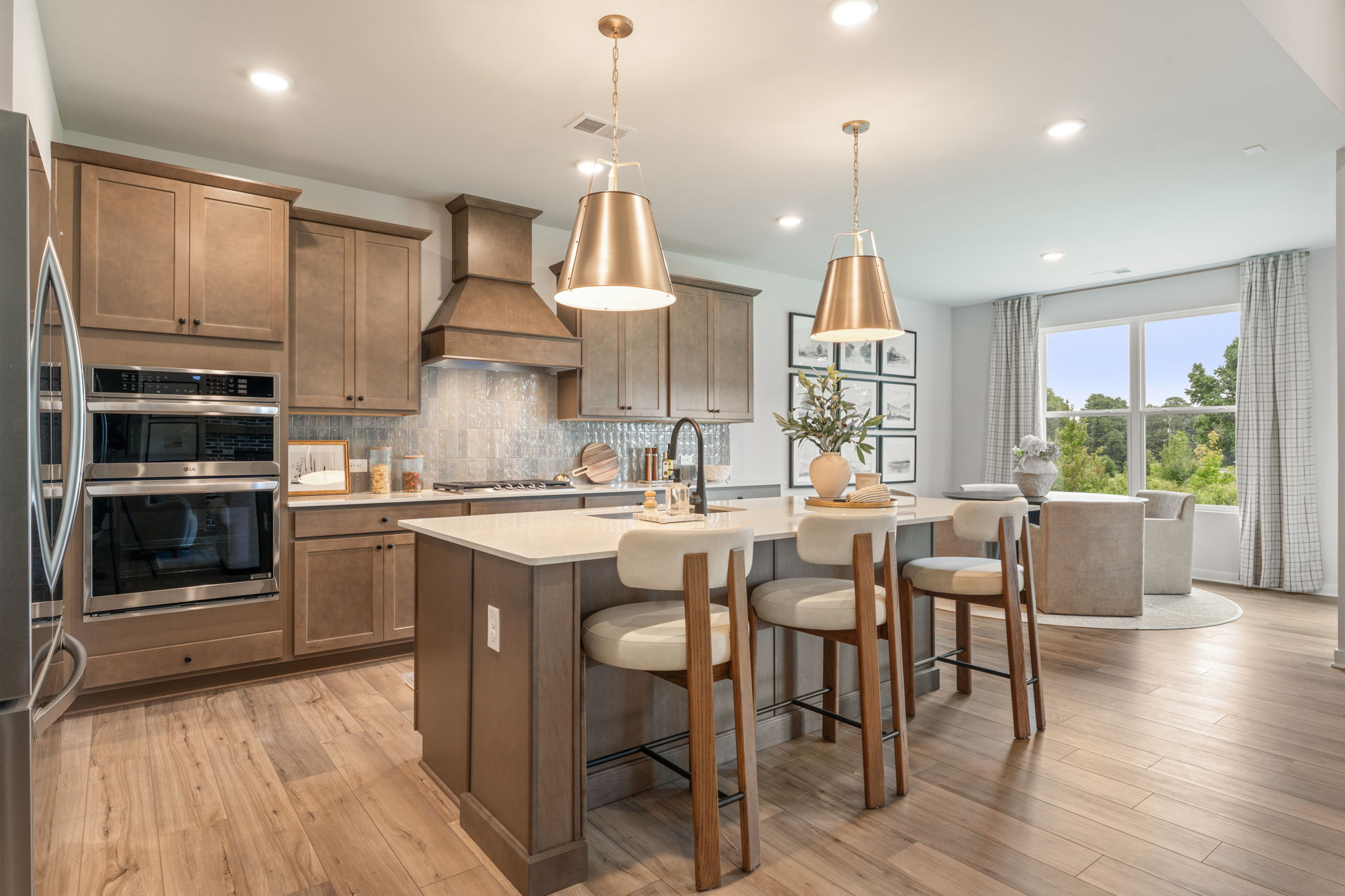 A kitchen with a stove and oven.