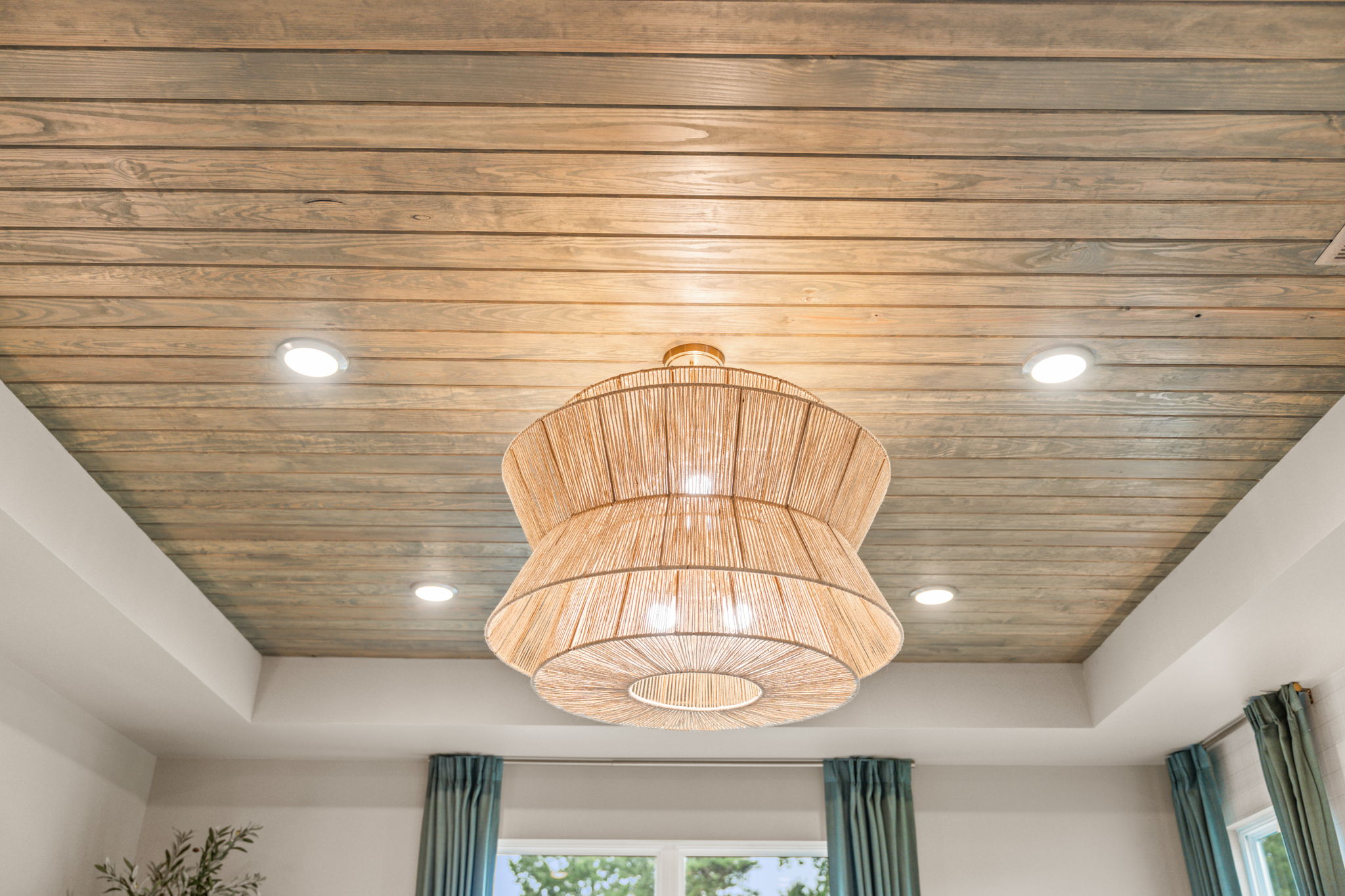 A chandelier from a ceiling.