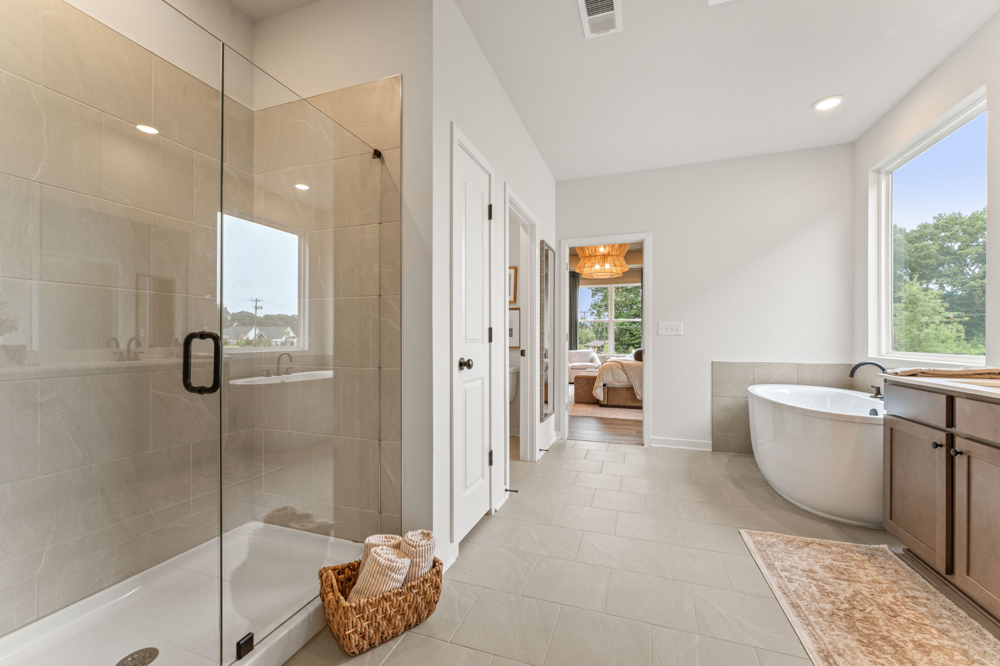 A bathroom with a glass shower.