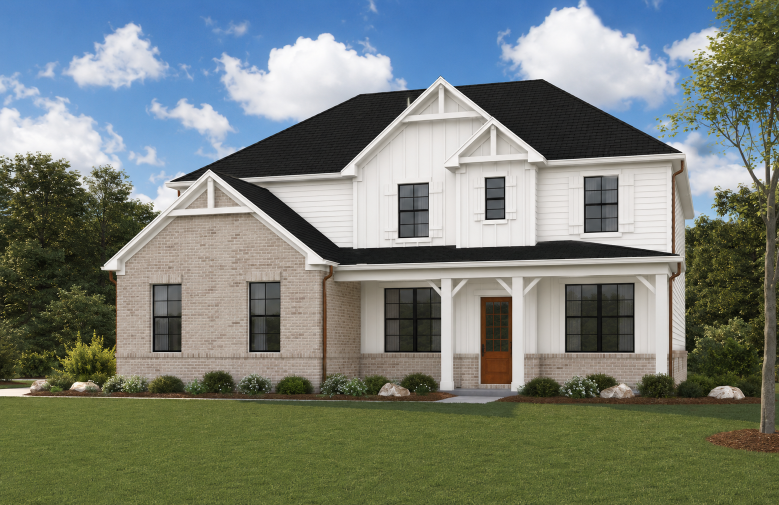 A house with a lawn in front of it.